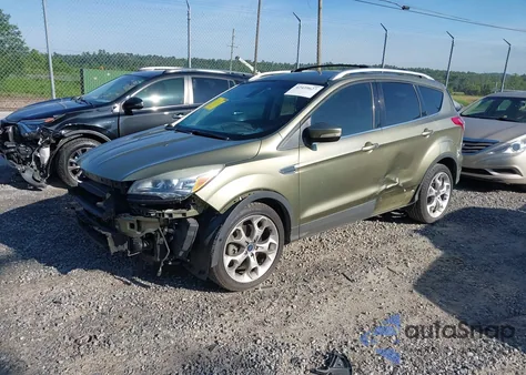 2013 Ford Escape Titanium z USA, uszkodzony, nr VIN 1FMCU0J96DUB38120
